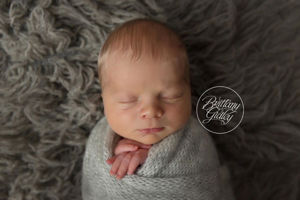 Newborn Baby in Gray