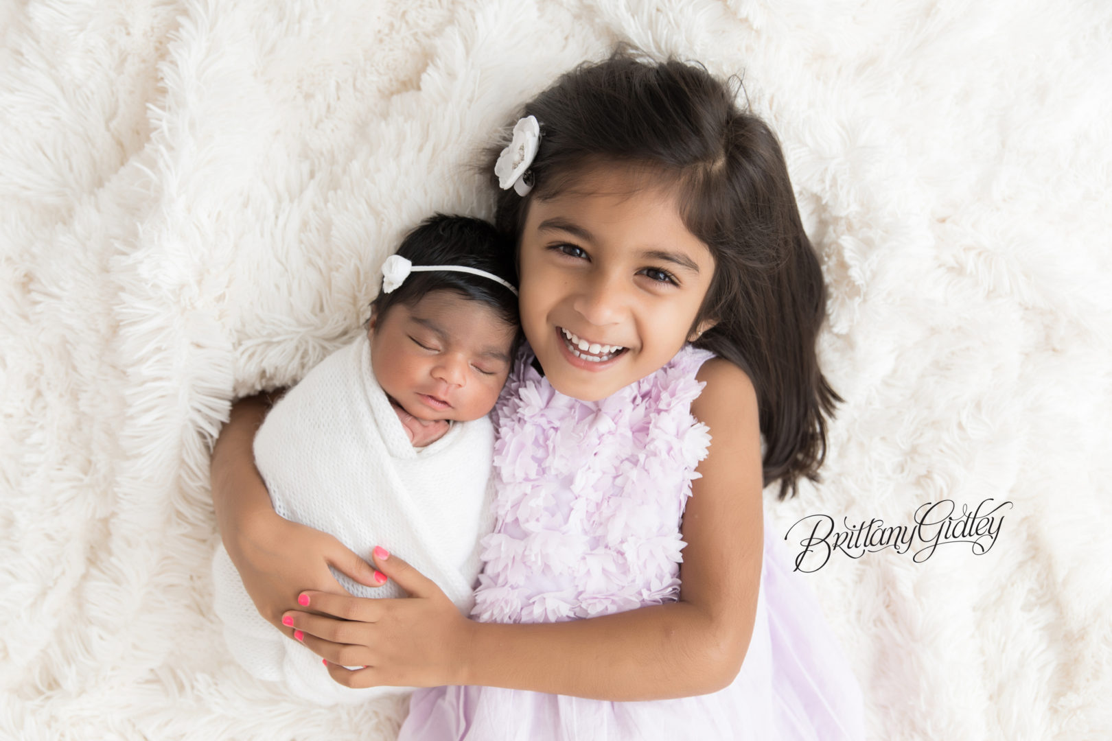 Newborn Baby and Sister
