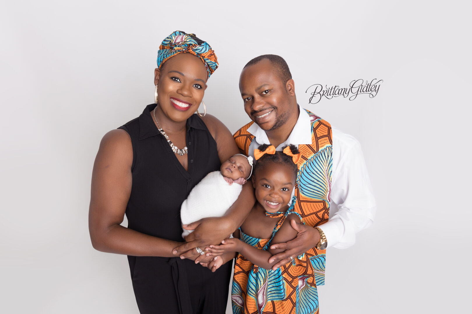 African Garb Family with Newborn