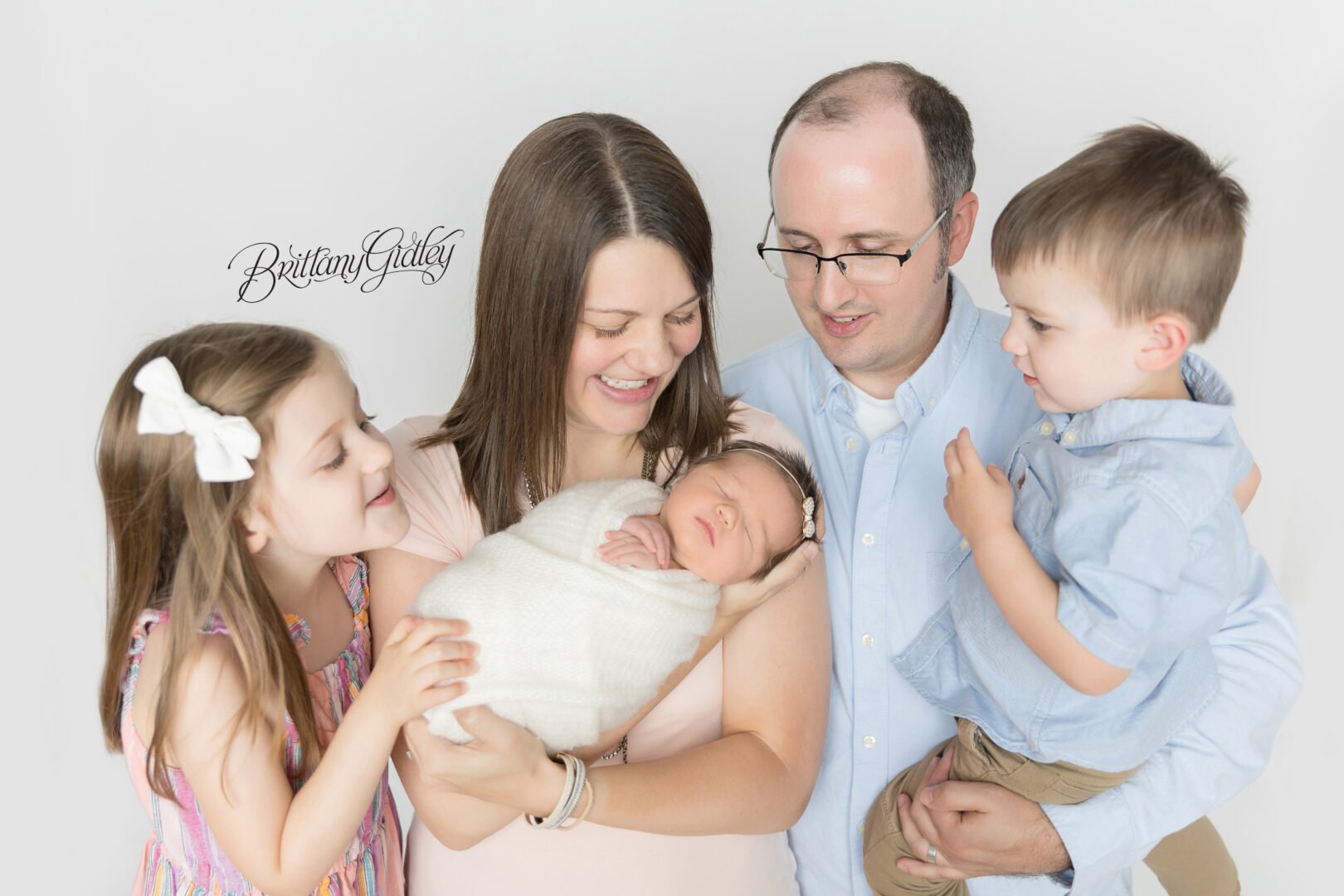 Family Photographer with Newborn