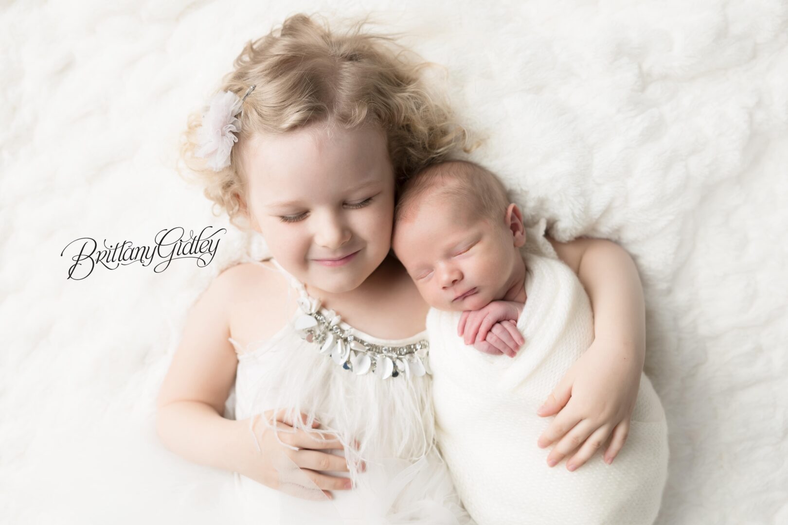 Newborn Baby and Sibling