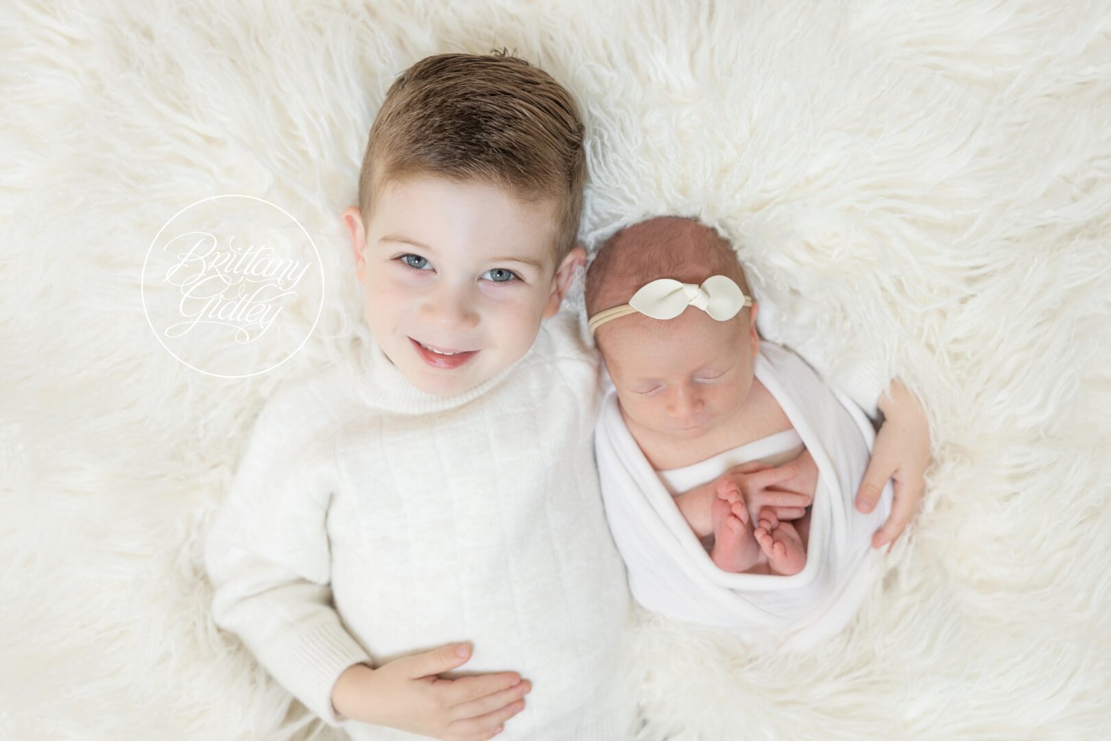 Newborn Baby and Sibling