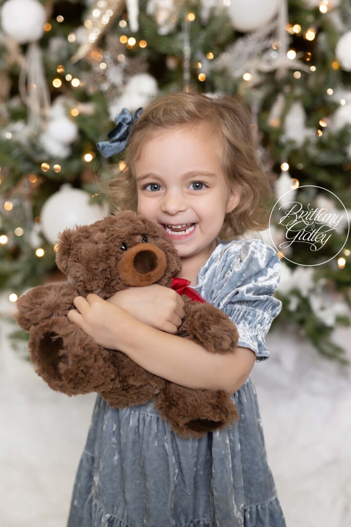 Girl Holding Bear