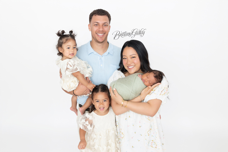 A family with a Newborn Photo Studio