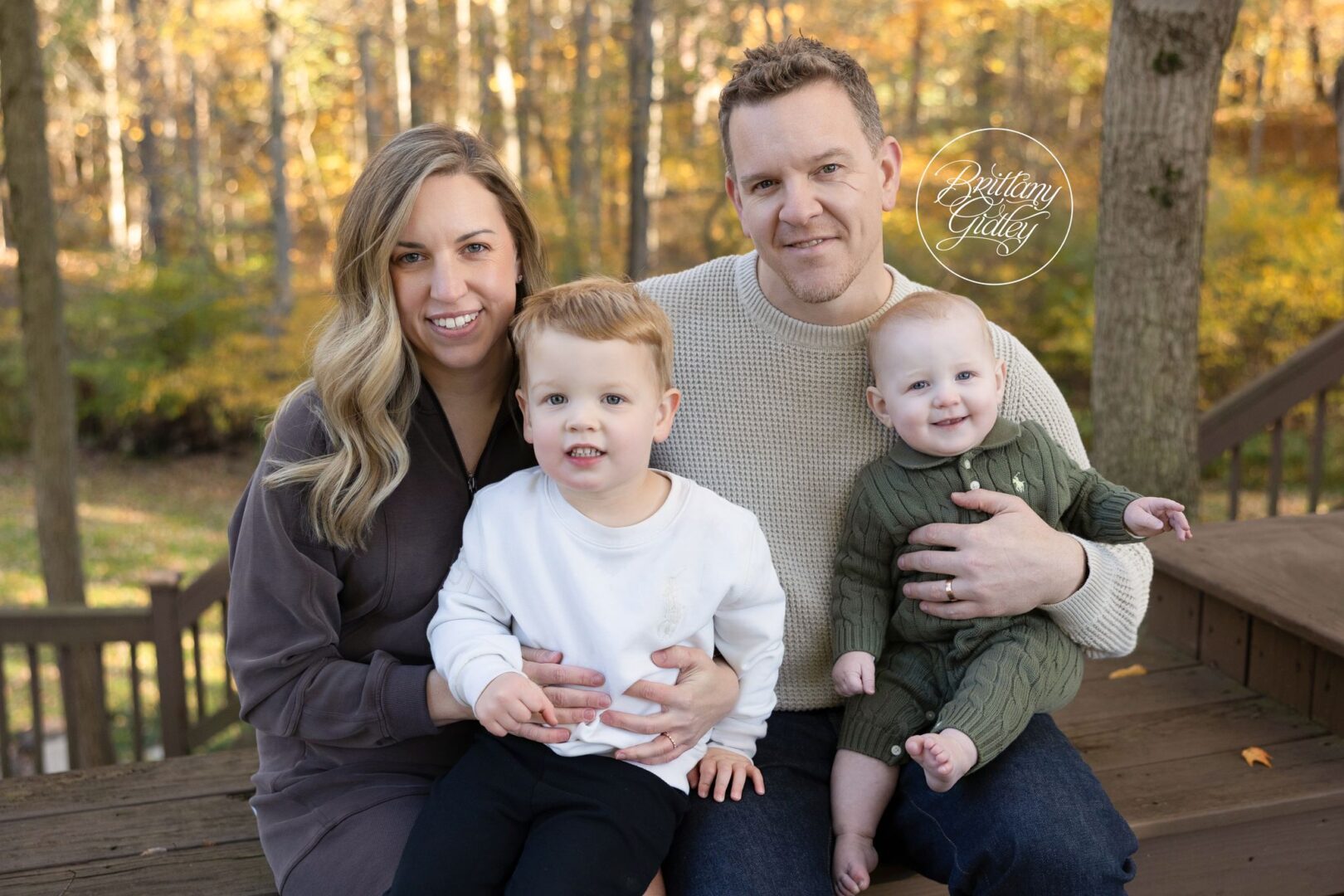 Miller family snuggled together on their back deck in Aurora Ohio
