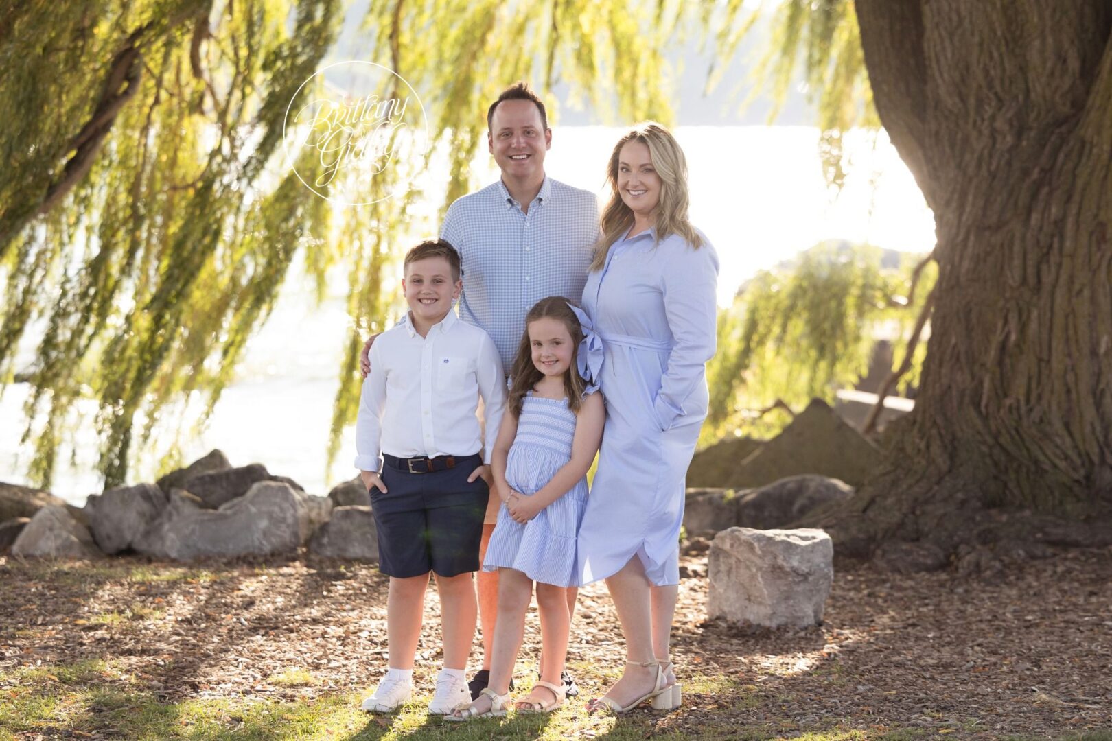 Westover family of four standing under a willow tree at Edgewater Park in Cleveland, Ohio
