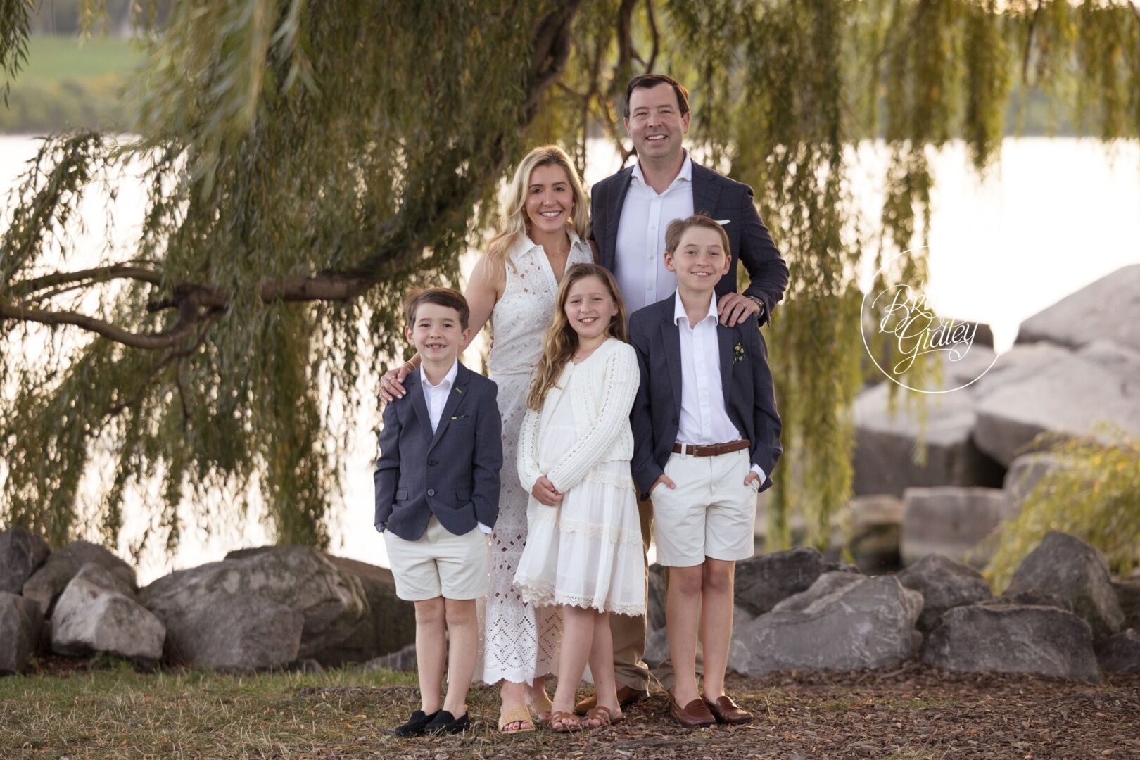 Mitchell family standing under a willow tree at Edgewater Beach in Cleveland